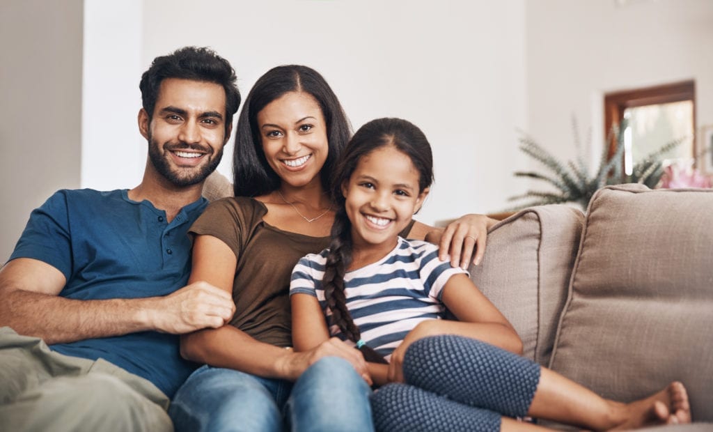Happy family turns a house into a home