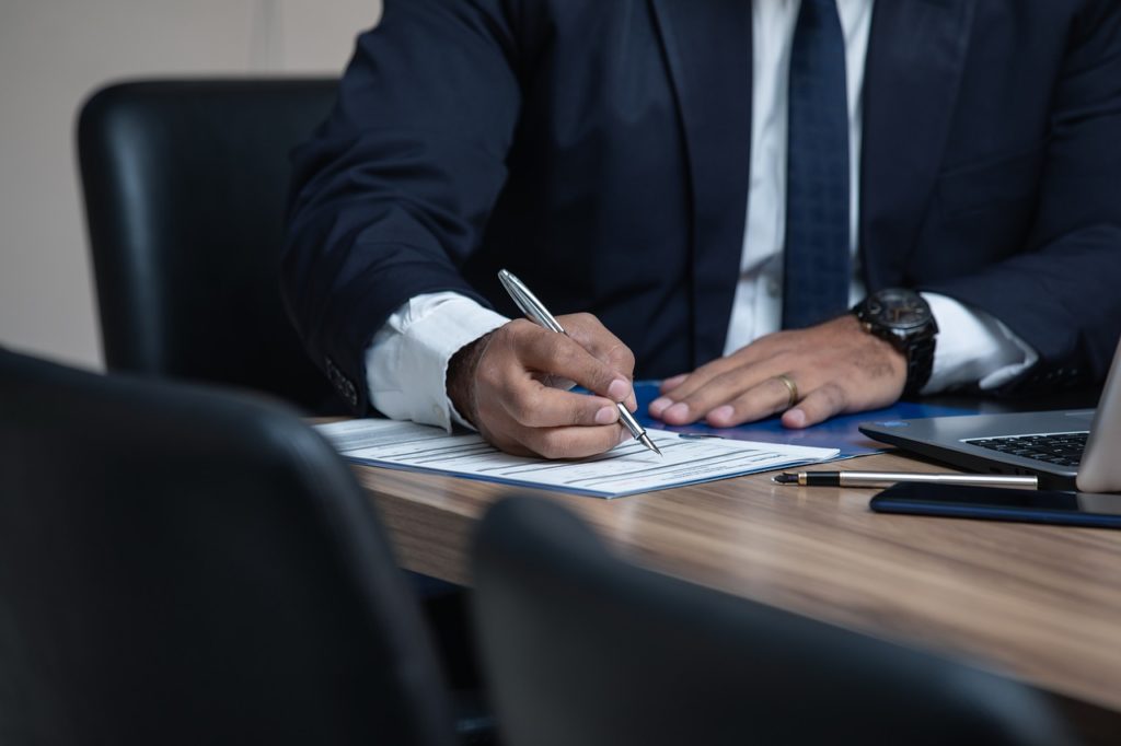 Man filling out application