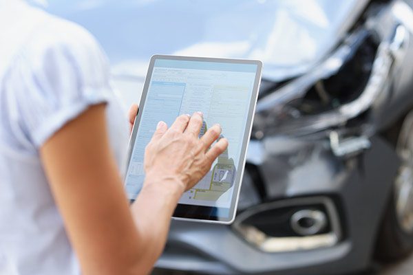 Person taking notes on a tablet