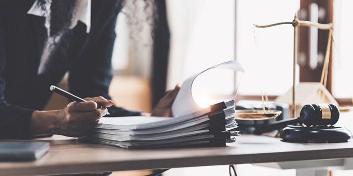 woman reviewing paperwork